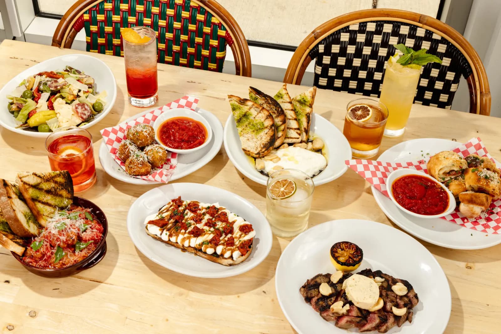 A steak with roasted lemon and shared plates at Rosie's Italian in Cincinnati